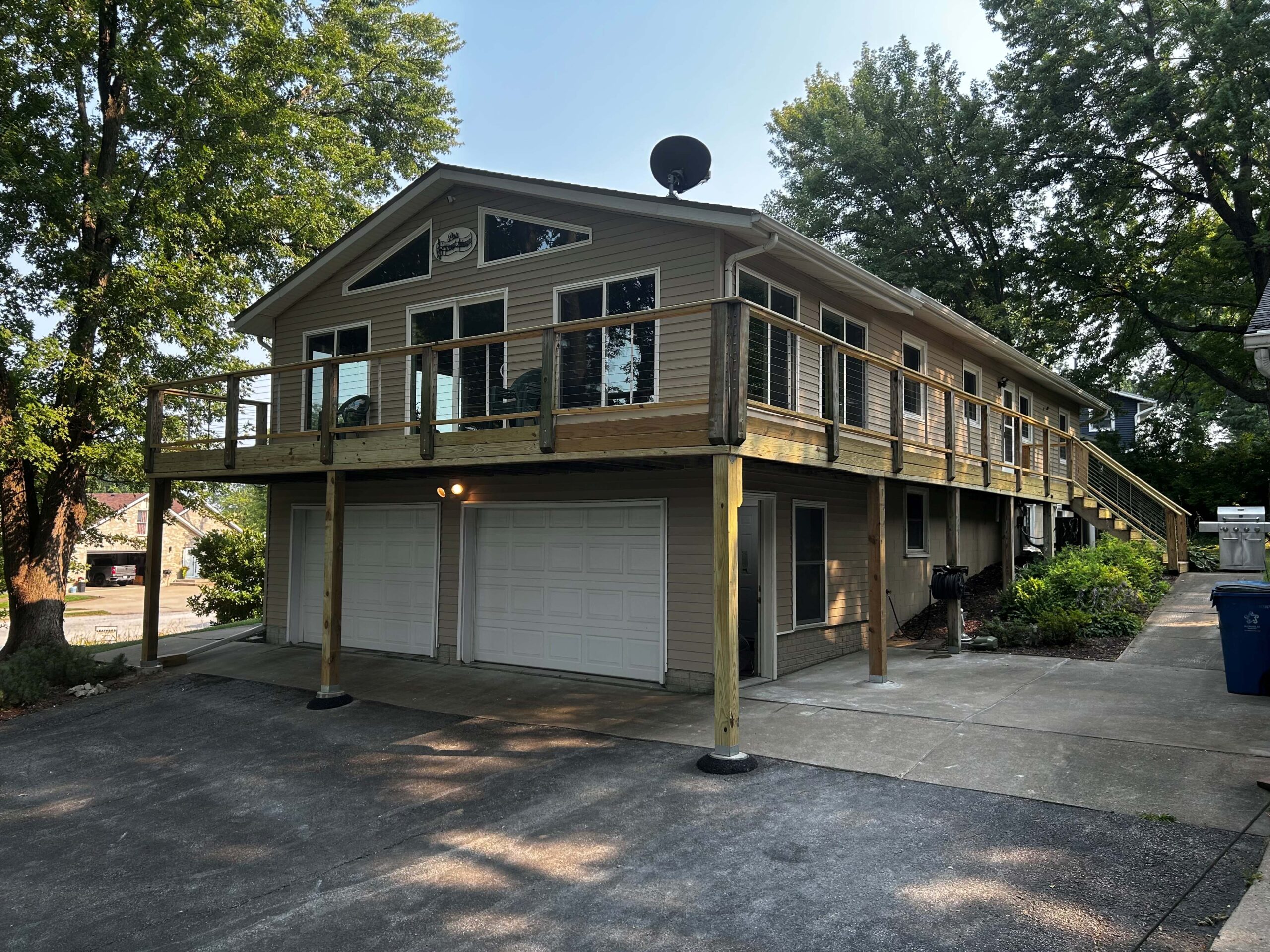Large wraparound deck rebuilt by Leathers Construction Group